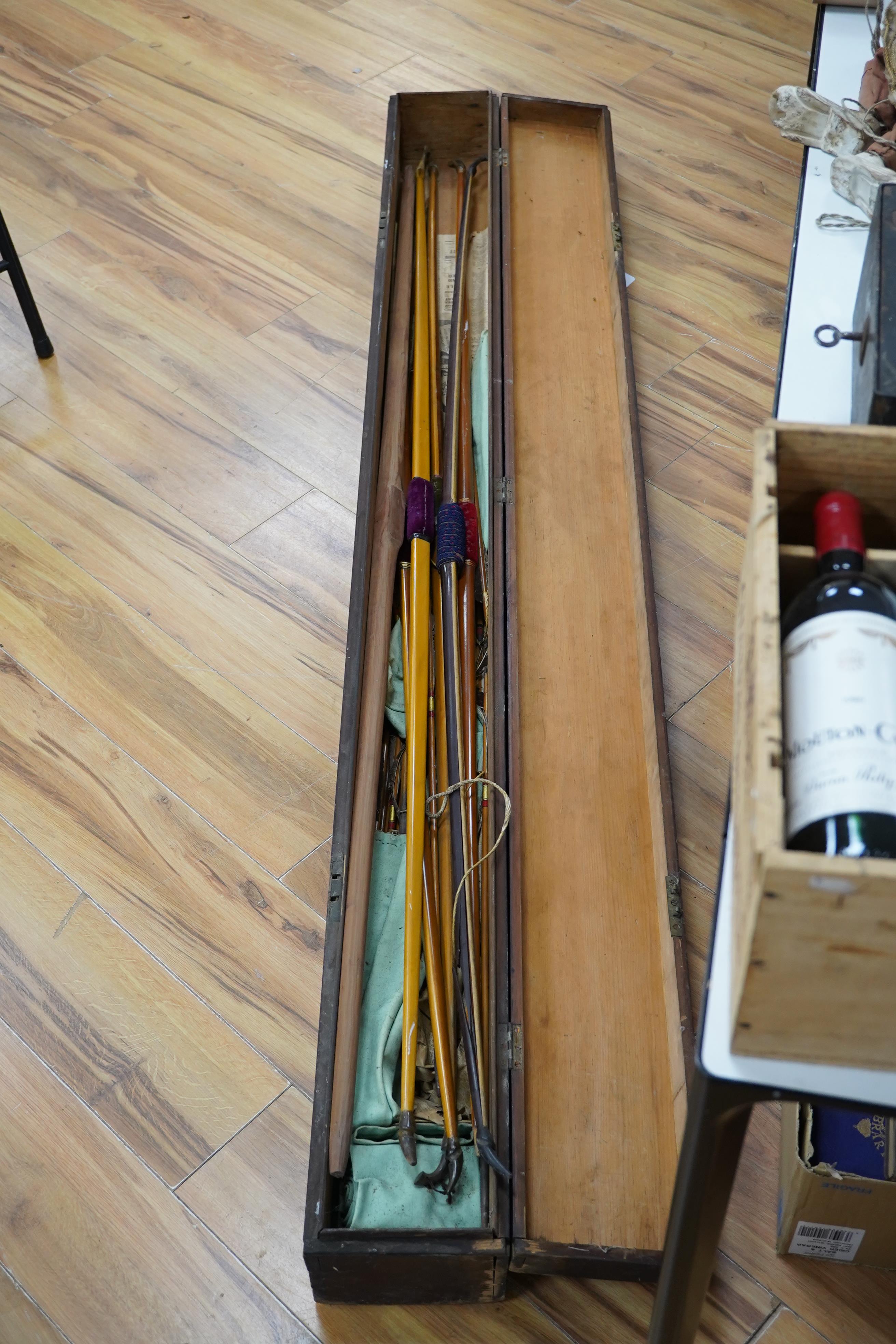 Five Victorian and later archery longbows, a blank for a longbow, and a selection of arrows, boxed. Condition - poor to good.